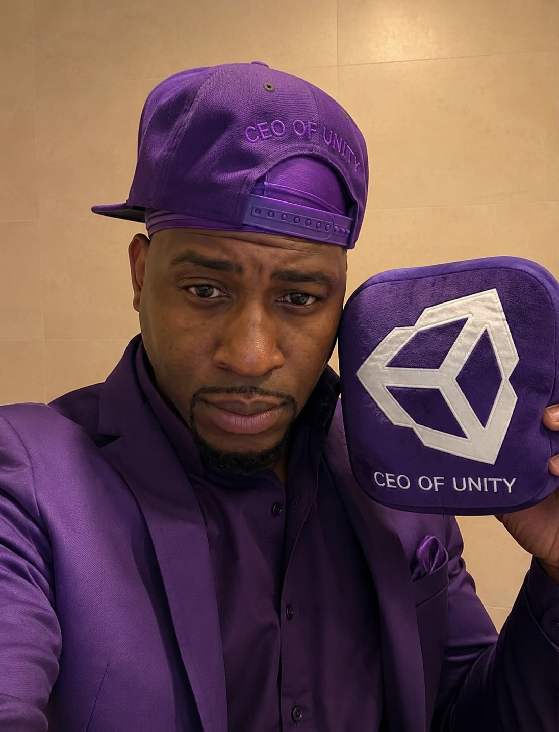 Suited up in that Unity purple 💜 Repping CEO OF UNITY all day. This community is everything — thank you for building it with us.